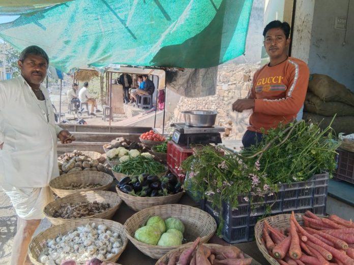 Nazir Hussain at his vegetable shop / Photo Credit: Najir Hussain